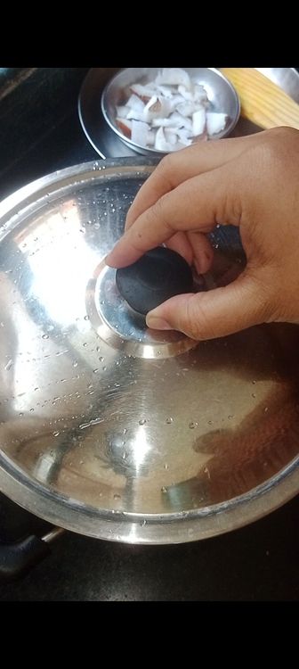 Step 1.5: Once they crackle and turn brownish in colour , add pinch of asafoetida with the chopped veggies