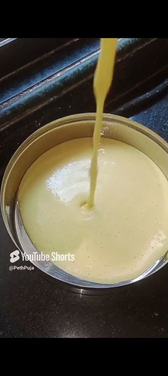 Step 1.2: Add eno or baking soda to the batter , mix few seconds and immediately pour in the container