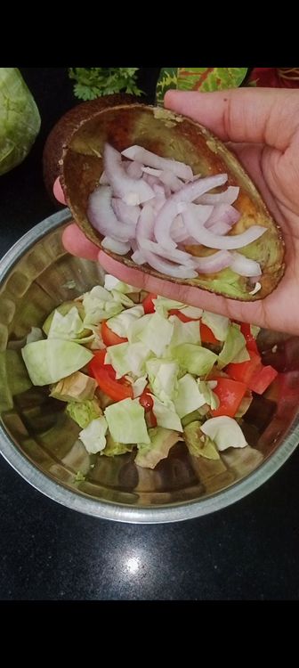 Step 1.3: Add the veggies like tomato, cabbage, onion and coriander leaves You can add other veggies as well of your choice like cucumber, sweet corn, capsicum, etc