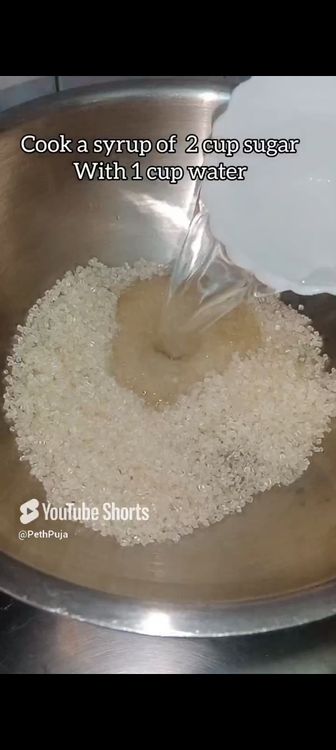 Step 2.1: In a pan , add sugar with water 