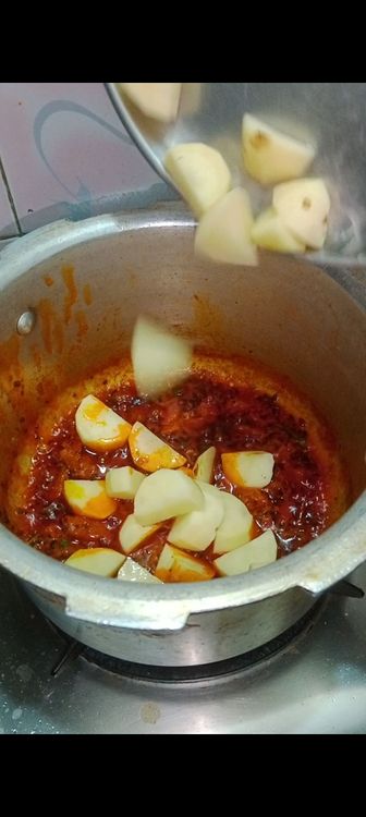 Step 1.1: Now add the main ingredient that is potato cubes with kitchen king masala