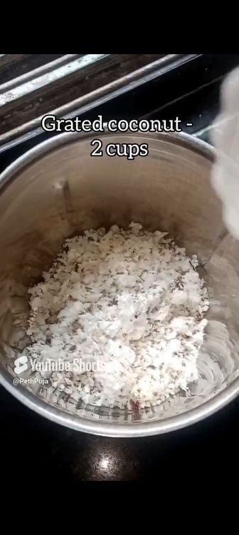 Step 1.3: In a mixie jar, put roasted chana dal, green cardamom pods, grated coconut, rice flour, jaggery powder, water and pinch of salt