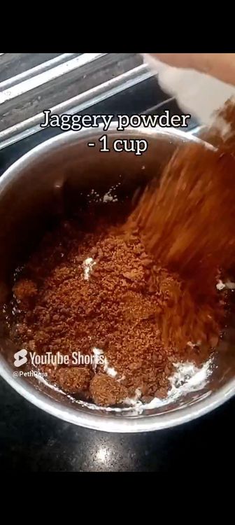 Step 1.5: In a mixie jar, put roasted chana dal, green cardamom pods, grated coconut, rice flour, jaggery powder, water and pinch of salt