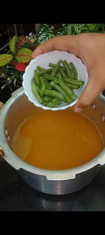 Step 1.1: Add all the veggies one by one as mentioned in the ingredients section from french beans - tomato