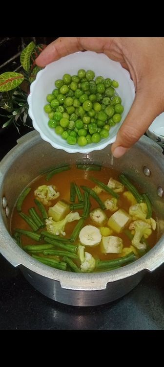 Step 1.5: Add all the veggies one by one as mentioned in the ingredients section from french beans - tomato