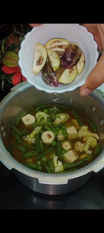 Step 1.6: Add all the veggies one by one as mentioned in the ingredients section from french beans - tomato