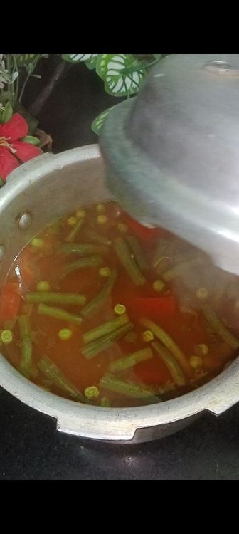 Step 1.2: Close the lid and pressure cook for 1-2 whistles on medium heat if using a traditional pressure cooker