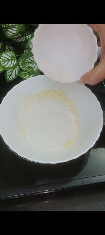 Step 1.1: In a bowl, mix besan and rice with milk to form a smooth batter