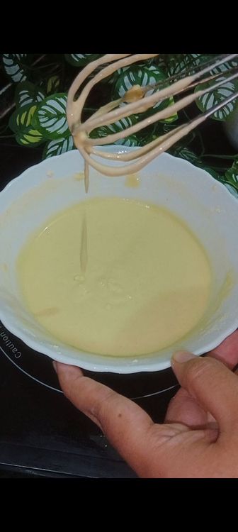 Step 1.4: In a bowl, mix besan and rice with milk to form a smooth batter