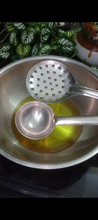 Step 1.2: Heat ghee in a deep pan for frying