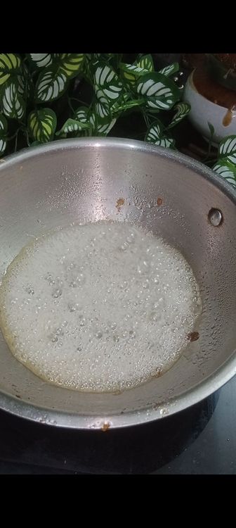 Step 2.2: In a pan, dissolve the sugar with enough water to just cover it (about ½ cup)