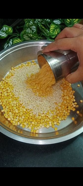 Step 1.1: Rinse and soak the chana dal, toor dal, moong dal, and urad dal together in water for 4-5 hours