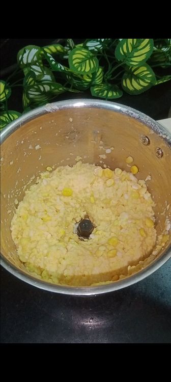Step 1.2: Drain the soaked dals and transfer them to a grinder