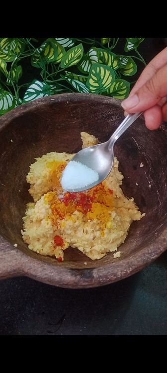 Step 2.1: In a bowl, combine the ground dal mixture with chopped onions, coriander leaves, cumin seeds, turmeric and red chilli powder , salt , ginger and green chillies