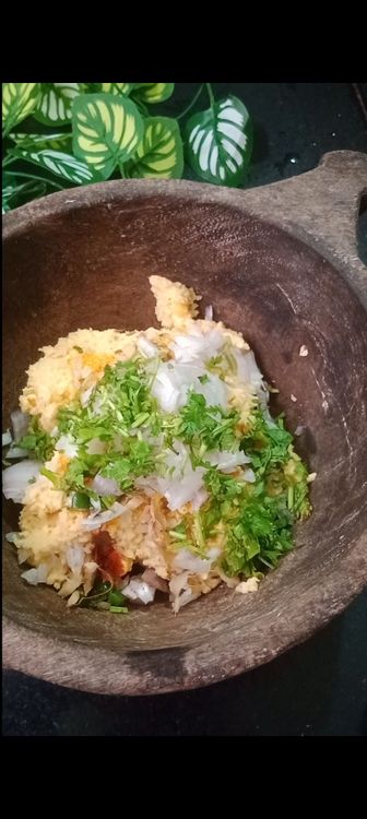 Step 2.3: In a bowl, combine the ground dal mixture with chopped onions, coriander leaves, cumin seeds, turmeric and red chilli powder , salt , ginger and green chillies
