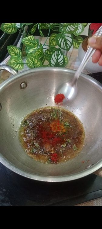 Step 1.1: Add turmeric and red chili powder, goda masala and simmer for few minutes