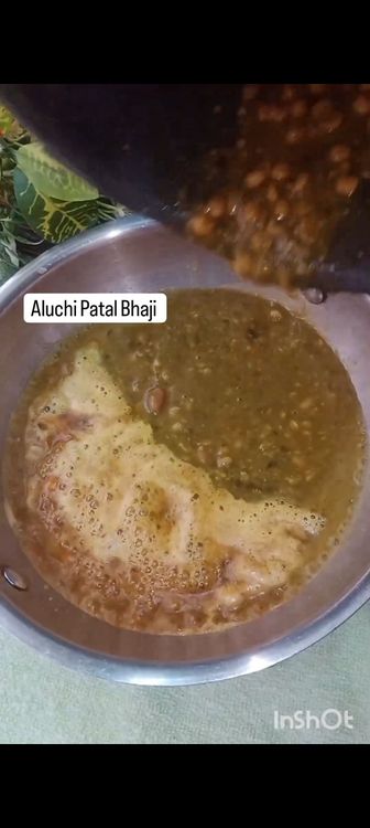 Step 2.2: Ad the masalas mentioned and quickly add cooked dal