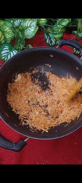 Step 1.2: Once vermicelli is roasted well , add raisins, sugar and crushed cardamom