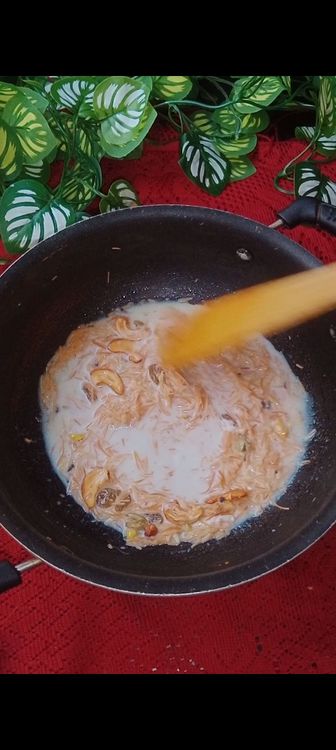 Step 1.2: Add boiled milk , stir and cover