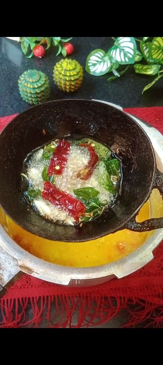 Step 3.1: Heat coconut oil, add mustard seeds, cumin seeds, crushed garlic pods , dry red chilli, few curry leaves and pinch of asafoetida