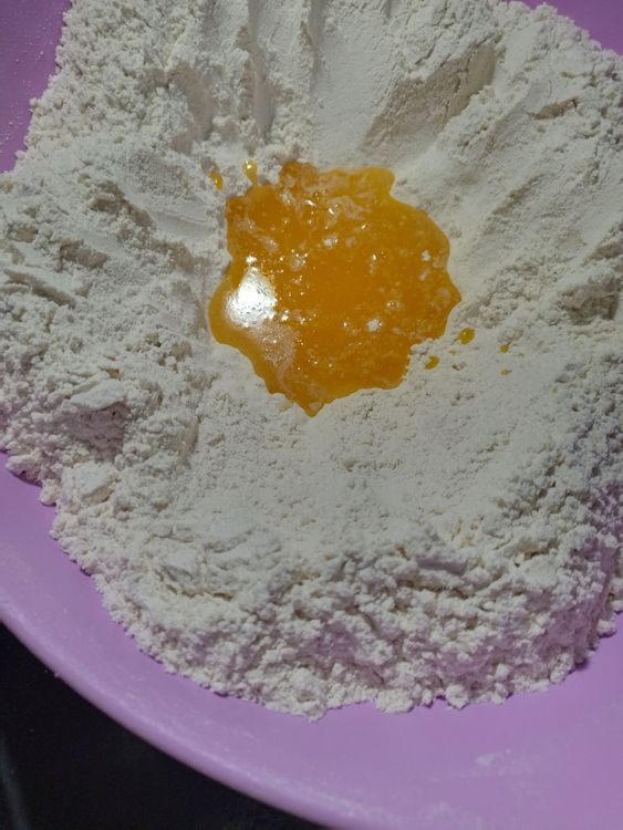 Step 1.1: Pour in the melted butter, egg mixture, and 1 cup of water