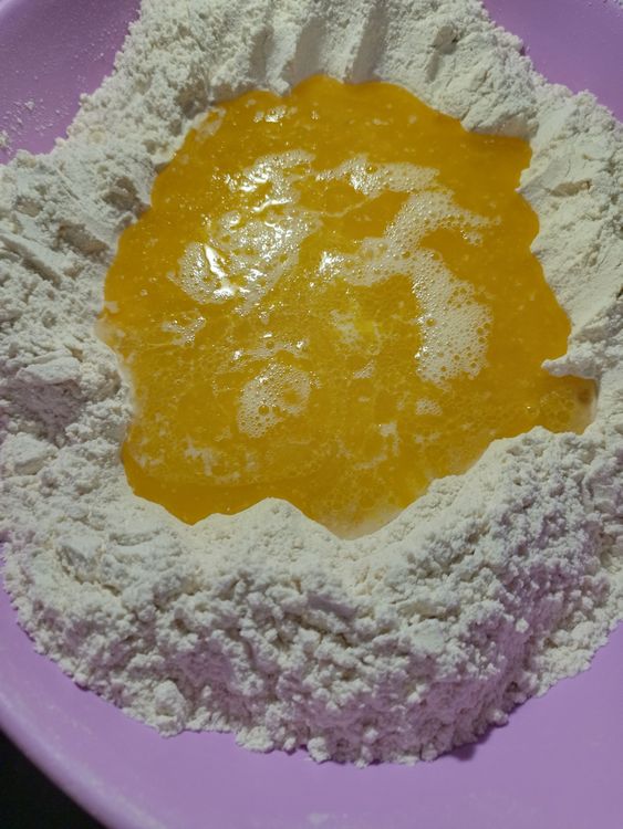 Step 1.3: Pour in the melted butter, egg mixture, and 1 cup of water