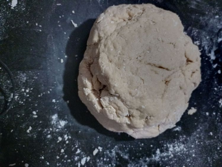 Step 1.2: Add the rest of the water and keep mixing until a dough is formed