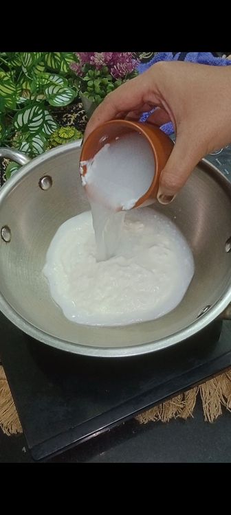 Step 1.1: In a vessel , add 3/4 cup curd with 2 cups of water