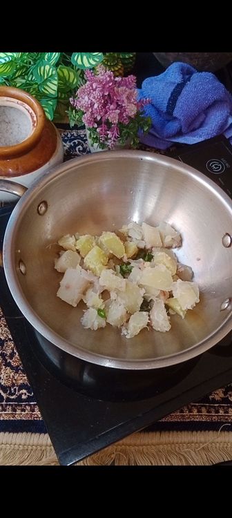 Step 1.1: Add boiled sweet potatoes, pinch of senda namak and roasted crushed peanuts