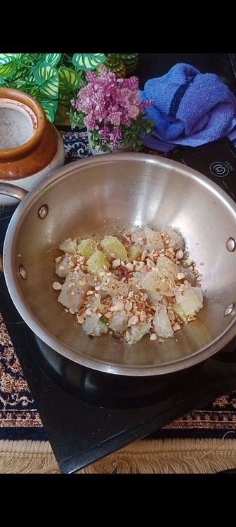 Step 1.2: Add boiled sweet potatoes, pinch of senda namak and roasted crushed peanuts