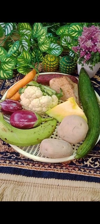 Step 1.1: Take raw banana, potatoes, yam, sweet potato, cauliflower, carrots, and chop into medium size cubes