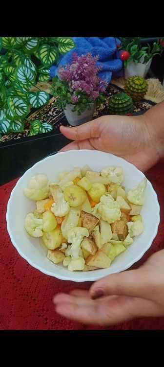 Step 1.7: Take raw banana, potatoes, yam, sweet potato, cauliflower, carrots, and chop into medium size cubes