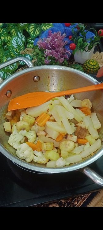 Step 1.2: Next add turmeric powder, red chilli powder salt and fried veggies