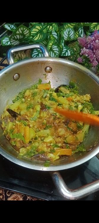Step 1.3: Add Grated coconut and chopped spinach