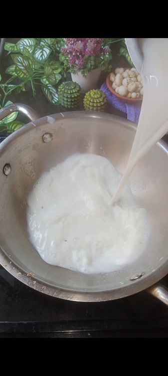 Step 1.2: In the same wok, add 1 tbsp water and 500 ml full cream milk
