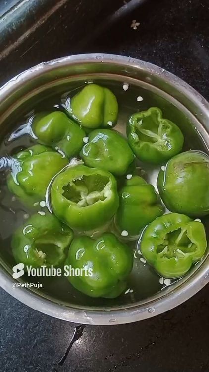 Step 1.3: Wash green capsicum really well and then cut the cap as shown below, deseed the capsicums and wash again to remove seeds completely