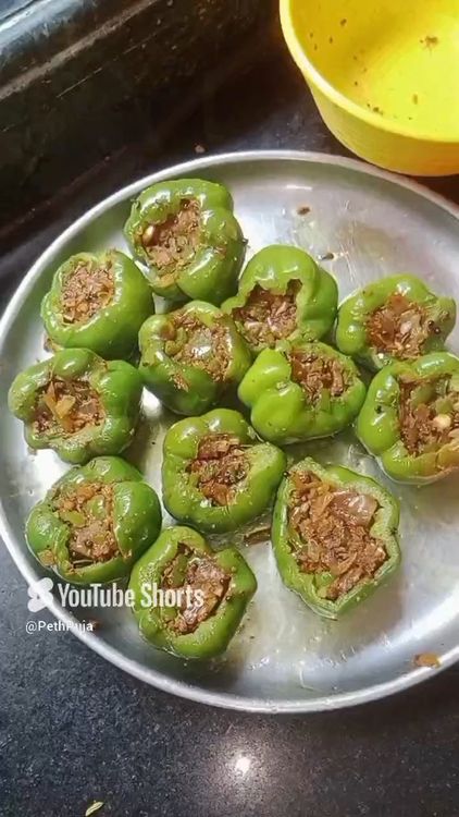 Step 1.1: Put the stuffing in the capsicum , dip in the besan batter and deep fry the capsicum