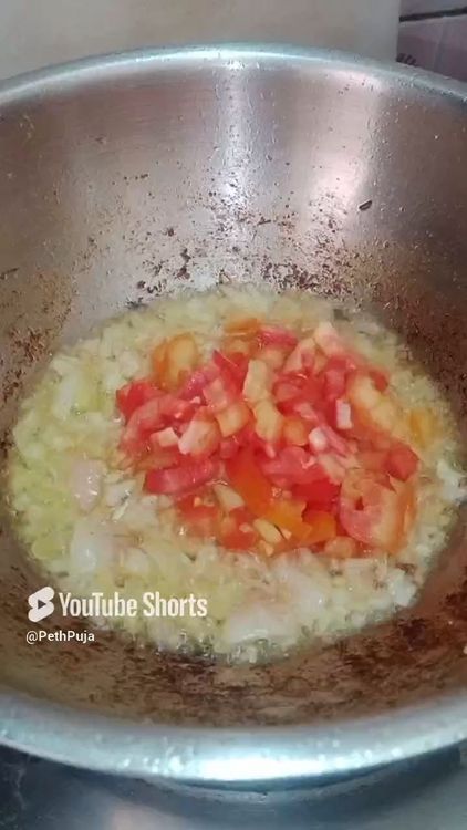 Step 2.1: Heat oil , toss finely chopped onion-tomato till it completely turns mushy , then add simple basic spices mentioned above till oil separates