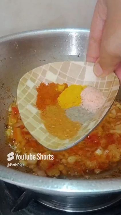 Step 2.2: Heat oil , toss finely chopped onion-tomato till it completely turns mushy , then add simple basic spices mentioned above till oil separates