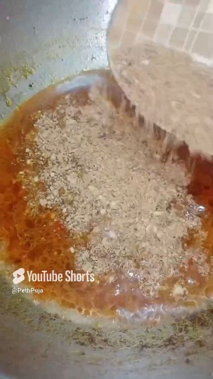 Step 2.2: Add water , simmer then add roasted peanut powder