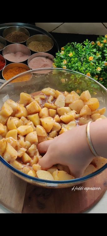 Step 1.2: Add the tamarind water to the mixture and mash a few potatoes to combine the flavors