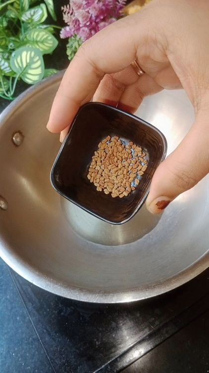 Step 1.1: Heat peanut oil in a wok, first add fenugreek seeds, when Fenugreek seeds crackle,  add mustard seeds