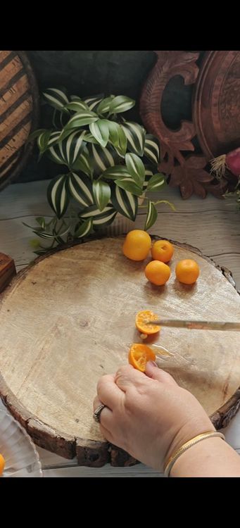Step 1.1: Cut each Narangi into four pieces and remove the seeds