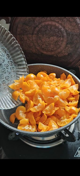 Step 1.1: Heat a heavy-bottomed pan and add the fruit and sugar