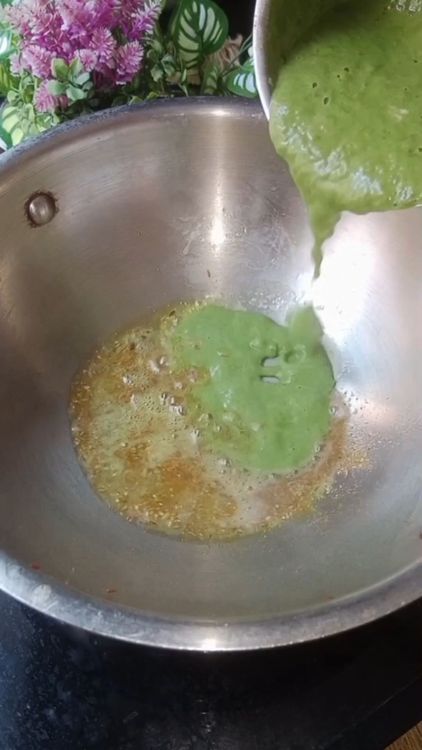 Step 3.2: Once the tempering is done , add the palak paste, salt and sugar