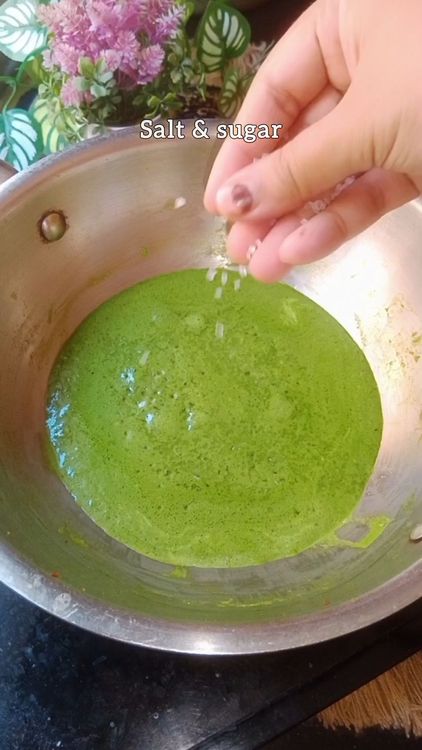 Step 3.4: Once the tempering is done , add the palak paste, salt and sugar