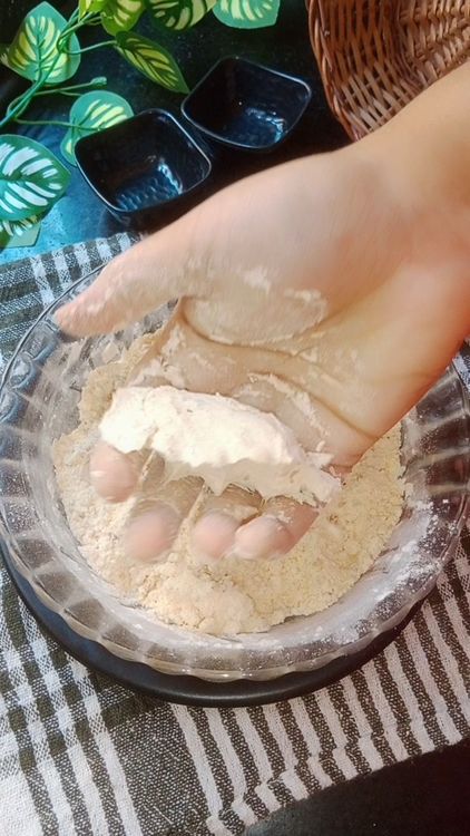Step 1.2: Add 1 tbsp hot oil, first mix using spoon as you might burn your fingers