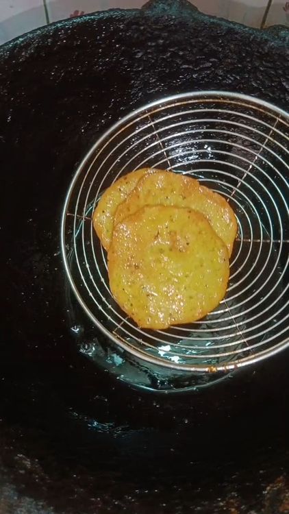 Step 1.2: Heat oil in a deep frying pan over medium heat
