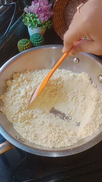 Step 1.1: Sieve besan well and add 2 cups of it on a large flat kadhai