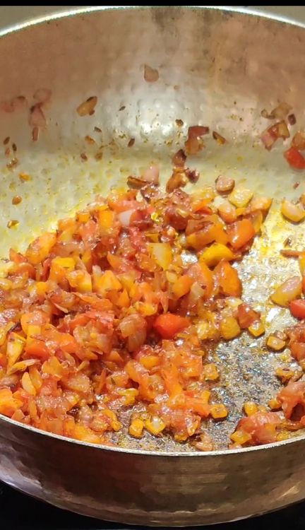 Step 2.1: Cook a little, then add red chilli and a little water, cooking until the masala releases oil